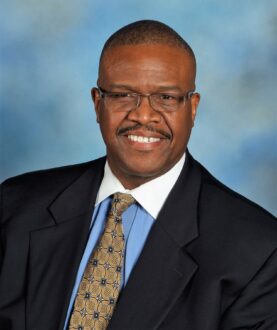 Dr Anthony L Moore