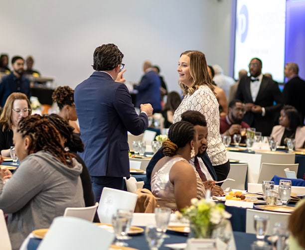 Guests Networking At Awards Banquet